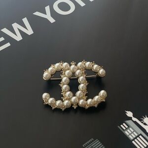 Pearl brooch pin monogram design